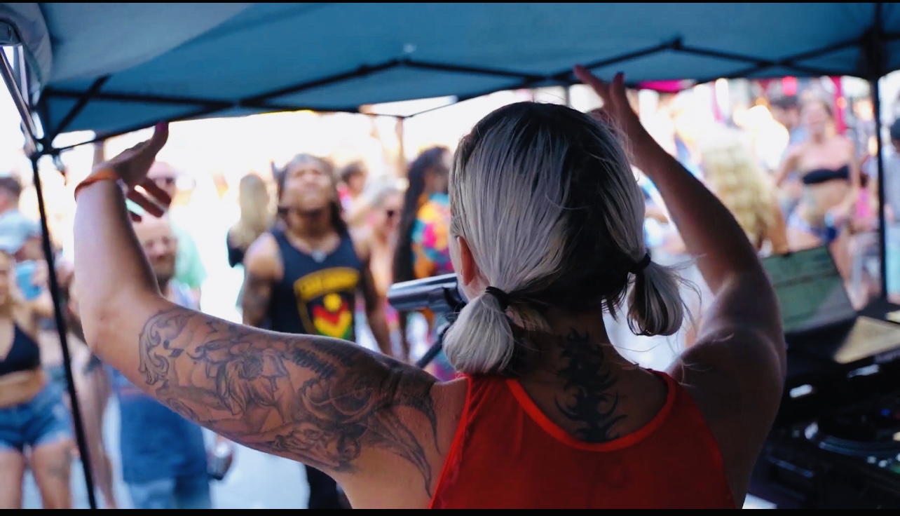 Clarissa engaging the crowd from stage