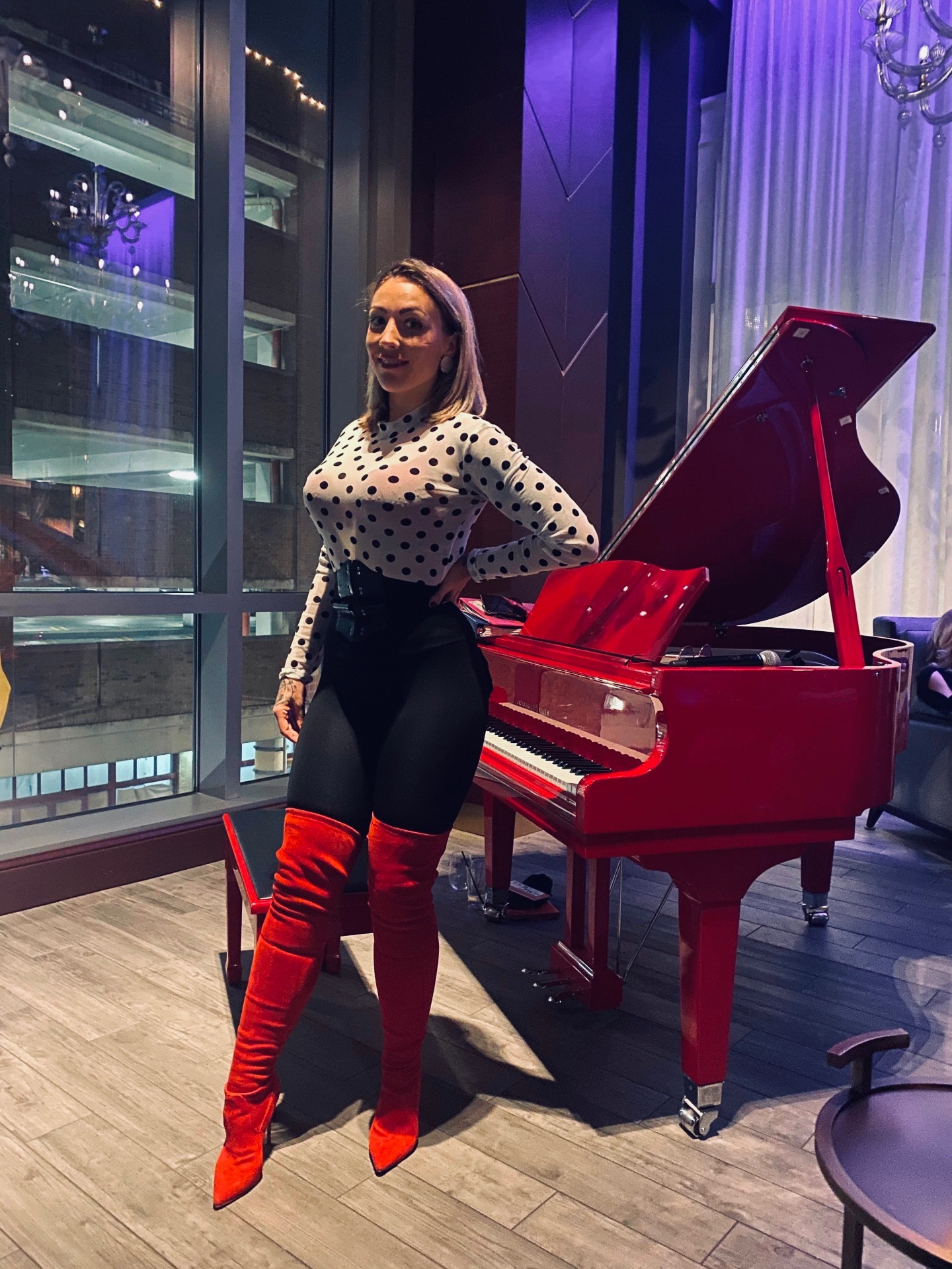 Clarissa at red piano venue